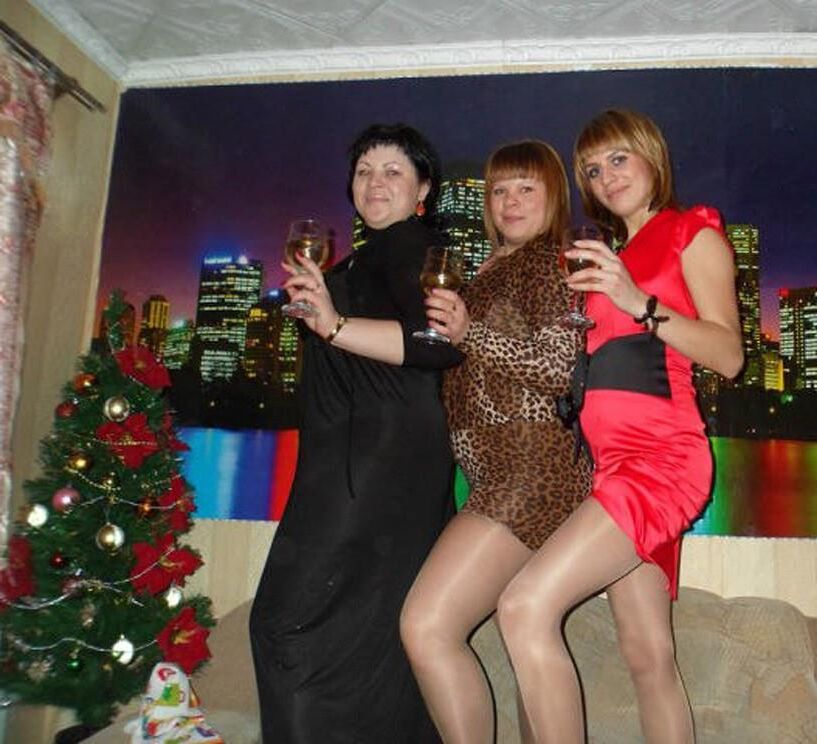 . Women fully dressed, no nudity