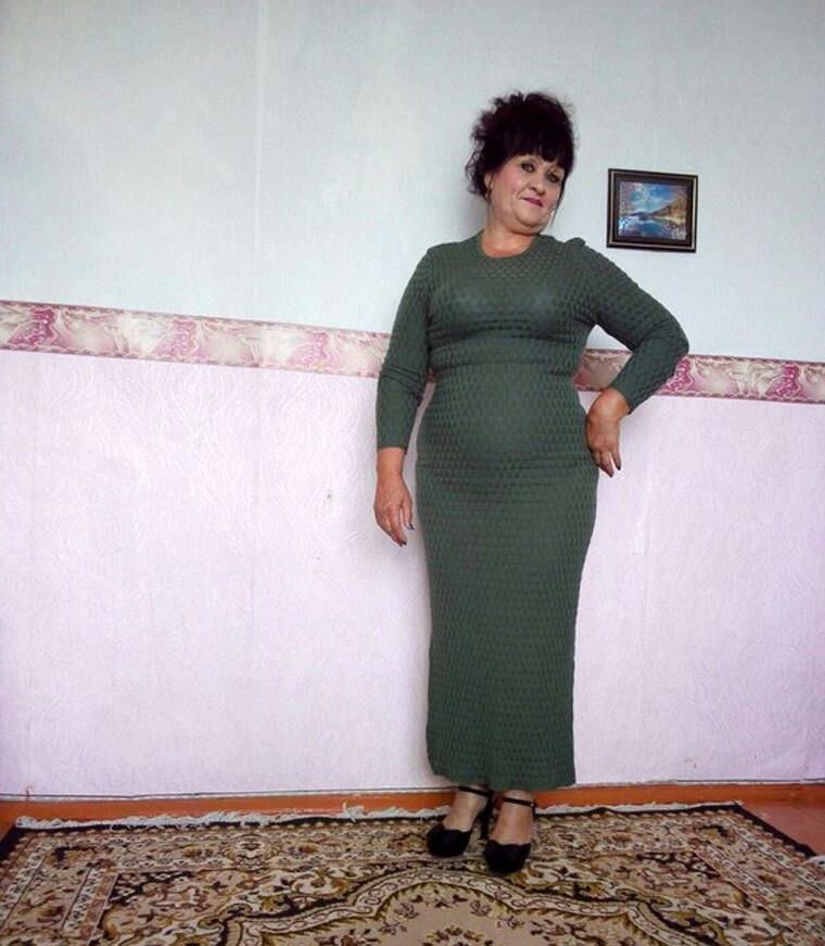 . Women fully dressed, no nudity