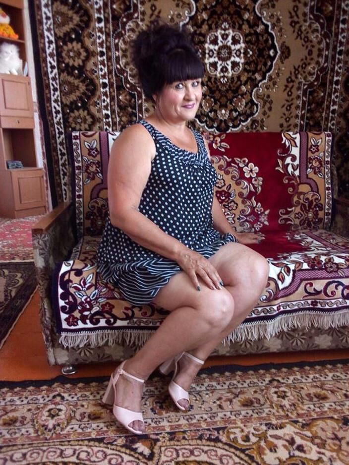 . Women fully dressed, no nudity