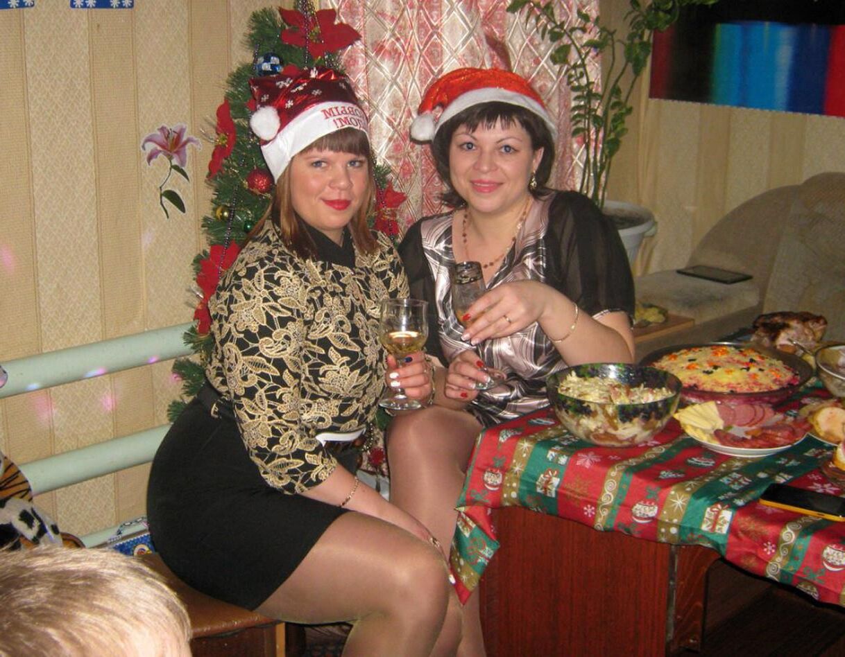 . Women fully dressed, no nudity