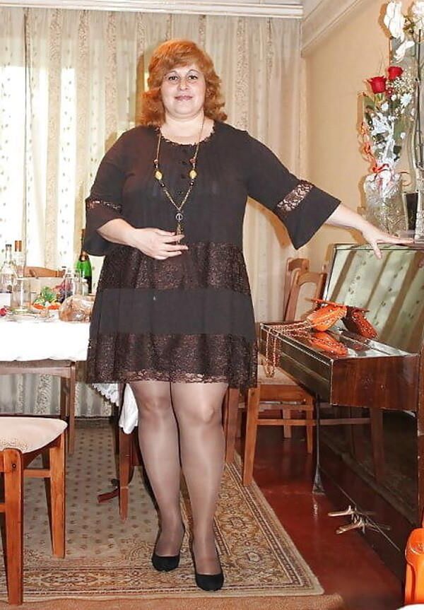 . Women fully dressed, no nudity