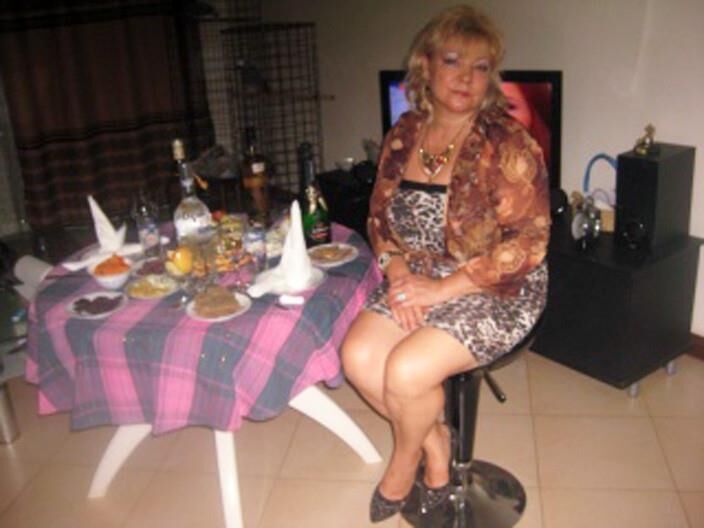 . Women fully dressed, no nudity