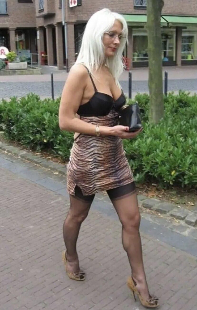 Mom, everybody can see your stockings tops 