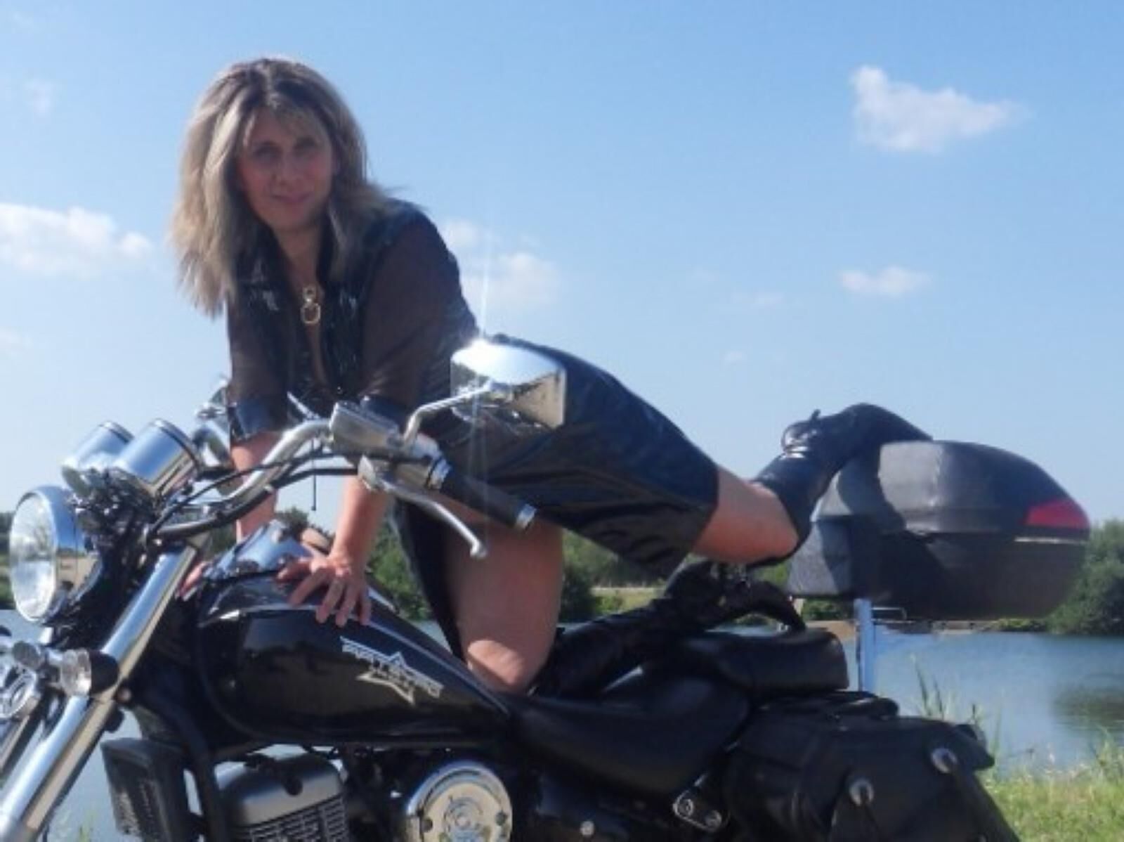 Lisa in a slut outfit on the motorcycle