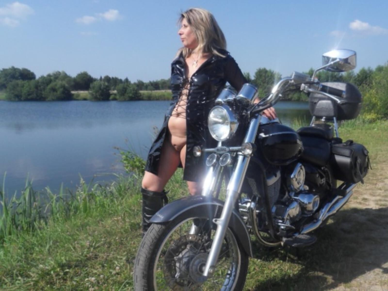 Lisa in a slut outfit on the motorcycle