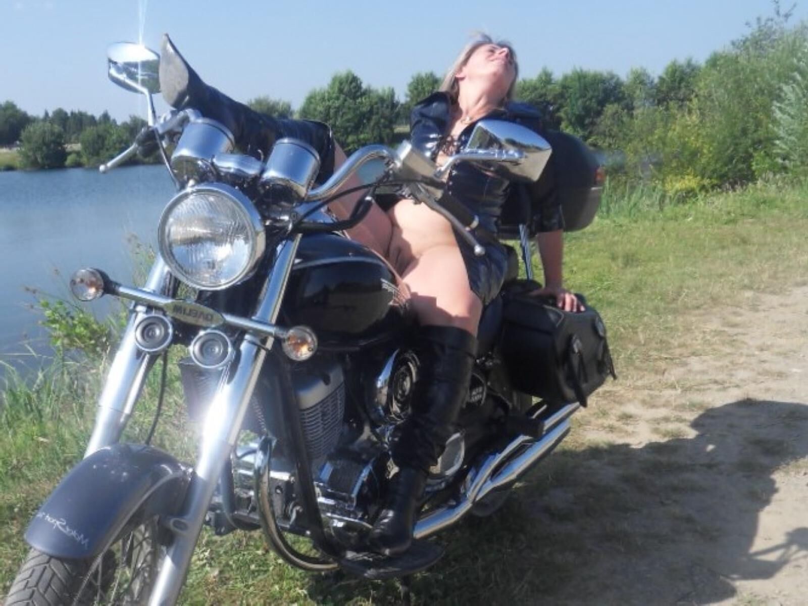 Lisa in a slut outfit on the motorcycle