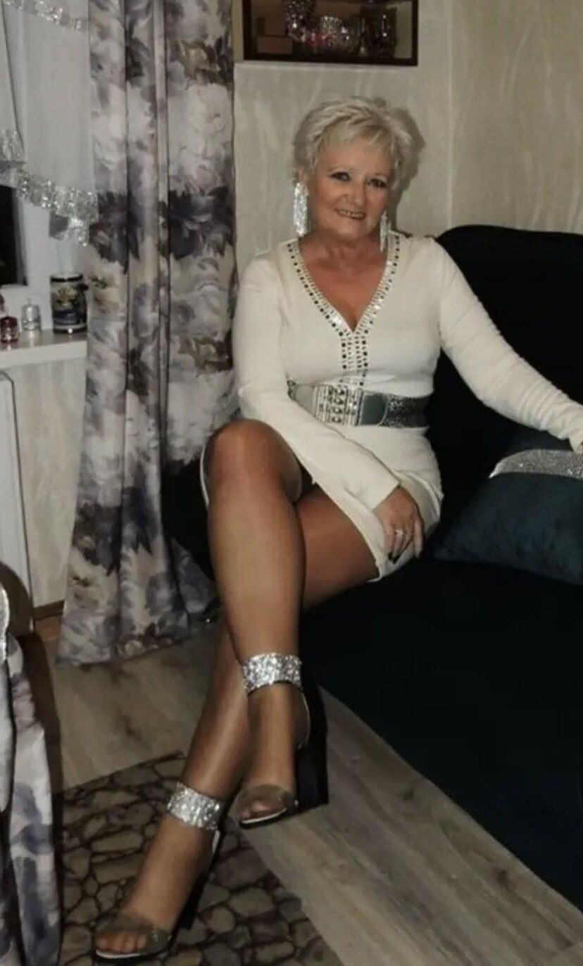 Mom, everybody can see your stockings tops 